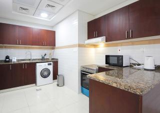 Scenic 1BR Apartment with Canal & Marina Views - 4