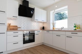 Küstenbutze im modernen Scandi-Style mit Garten und Terrasse - 5