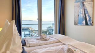 Apartment 25, Pier 25, Apartmenthaus Hafenspitze Blickrichtung offene SeeStrand - 4