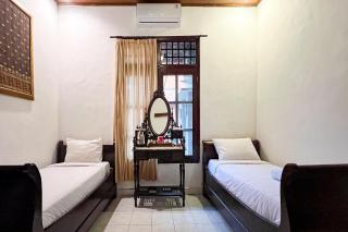 RedDoorz at Garden Suly Villa Peliatan Ubud - Ubud - 8