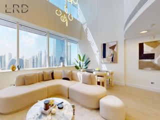Chic and Modern 2BR Duplex with City View - 8