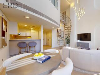 Chic and Modern 2BR Duplex with City View - 7