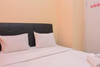 Comfort and Homey 2BR at Green Pramuka City Apartment By Travelio - Jakarta - 6