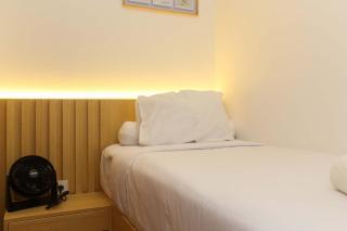 Comfort 2BR Apartment at Meikarta Apartment By Travelio - 6