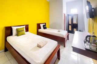 Urbanview Hotel Grand Seven One Manna - 8