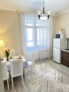 Уютные апартаменты в супер локации города - 1