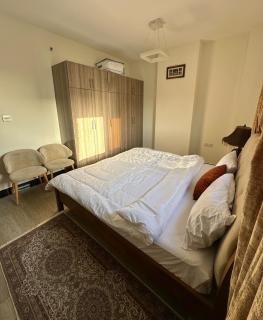 Entire 1-Bedroom Apartment with Balcony, Sharjah - 1