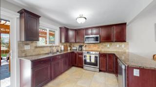 Charming four bedroom home with large yard and plenty of room for family - 2