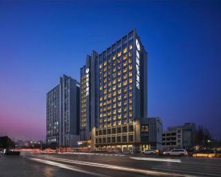 Happy Inn-Zhengzhou Railway St ation Erqi Square Branch喜鹊愉家酒店锦荣国际轻纺城店 - 0