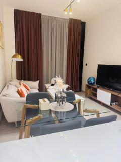 Elegant 1BR Apt in JVC Dubai with Spacious Balcony & City Views - 0