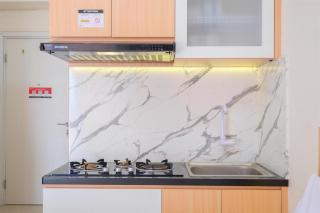 Nice and Comfy Studio at Green Pramuka City Apartment By Travelio - 9