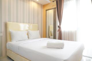 Cozy Stay Studio at Green Pramuka City Apartment By Travelio - 3