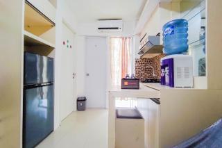 Nice and Comfort 2BR at Bassura City Apartment By Travelio - 1
