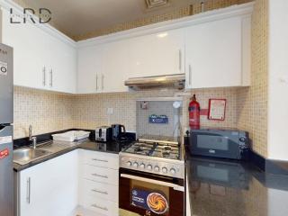 Charming 1BR Apartment with Canal View in Business Bay - 5