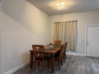 Newer Construction Home in Port Richey 3BR 2BA Bright with High Ceilings, Screened Lanai & Lake View, Fully Furnished, Conveniently Located on a Corner Lot with No Front Neighbors, Short Walk to US-19, Shops & Restaurants - 1