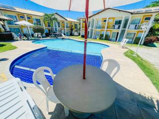 Flat's com 1 suíte no pavimento superior com internet privativa 300MBPS localizado no Residencial Mont Hebron, condomínio a aproximadamente 250m da praia de Taperapuã, com piscinas, sauna e portaria 24hrs - Porto Seguro - 2