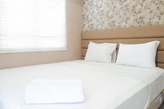 Comfy and Modern Wonderful 2BR Apartment at Tanglin Supermall Mansion By Travelio - Surabaya - 0