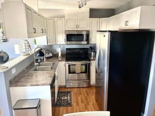 Top Floor Riverfront Condo with Stellar Sunsets! - 3