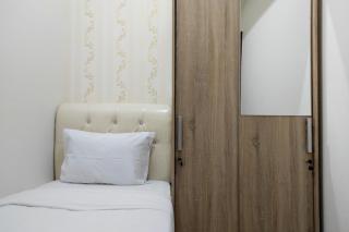 Simply and Clean 2BR Apartment at Vida View Makassar By Travelio - Pampang - 4