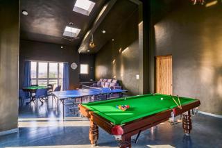 SaffronStays Six Oaks - 6BR Lakeside Villa with Pool, Games Room & Backwater Views - 8