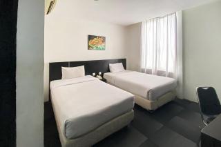 Urbanview Hotel Asyra Makassar - Makassar - 7