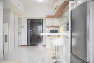 Warm and Comfort Living 1BR at 8th Ambassade Kuningan Apartment By Travelio - 1