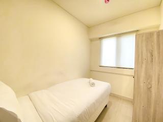 Fully Furnished and Homey 3BR at Meikarta Apartment By Travelio - Bekasi - 2