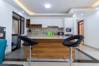 luxurious fully furnished two bedroom apartment with swimming fully equipped gym ample parking space children playing ground and a relaxing rooftop with amazing city views - Nairobi - 3