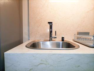 Elegant and Tidy 1BR at Uttara The Icon Apartment By Travelio - Kejayan - 4