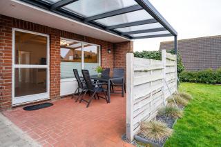 Neuland, zwei Schlafzimmer, überdachte Terrasse, eingezäunter Garten, Hund willkommen! - Greetsiel - 1