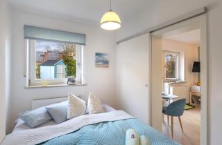 Sonnige, ruhige Gartenwohnung mit Terrasse u. Garten - Oberhaching - 7