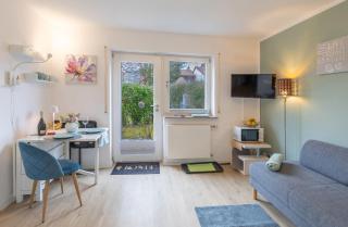 Sonnige, ruhige Gartenwohnung mit Terrasse u. Garten - Oberhaching - 4