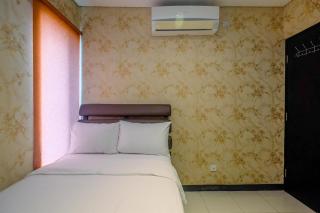 Comfort and Homey 2BR at Nifarro Park Apartment By Travelio - 4