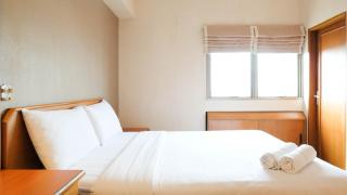 Extra Spacious and Homey 2BR at Kondominium Puncak Marina Apartment By Travelio - 5