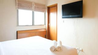 Extra Spacious and Homey 2BR at Kondominium Puncak Marina Apartment By Travelio - 1