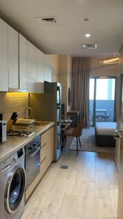 Furnished studio apartment next to metro - Dubai - 8