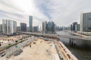 Canal View, Partial Burj Khalifa View, Brand New - 1