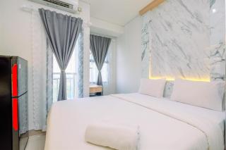 Cozy Stay and New Furnished Studio at Transpark Cibubur Apartment By Travelio - Depok - 1