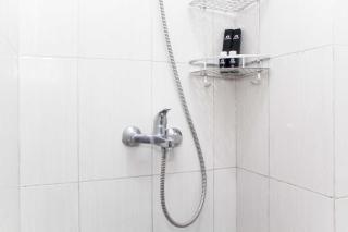 Homey and Tidy Studio Monroe Tower Apartment By Travelio - Cikarang - 5