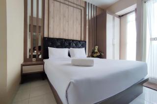 Comfortable and Modern 1BR without Living Room at Amartha View Apartment By Travelio - Semarang - 1