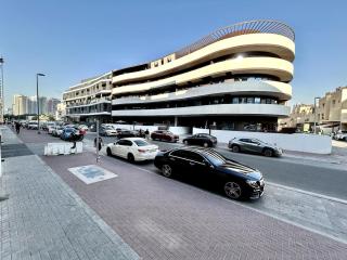 Homes2Retreat - Stylish Studio Gym & Pool, JVC Dubai - 1