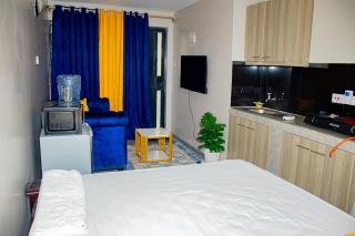 DefiniteHomes3 - Fully furnished studio apartment with a rooftop restaurant near JKIA Airport, SGR Terminus, Downtown - Nairobi - 3