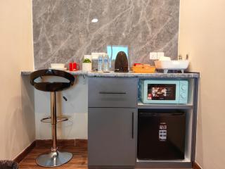Near Airport K Avenue Homestay by MINO Suites - Donggongon - 1