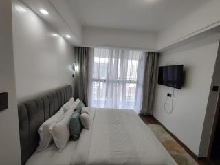 charming urban retreat apartment with private parking,fully equipped gym ,children playing ground and unbeatable city views - Nairobi - 4