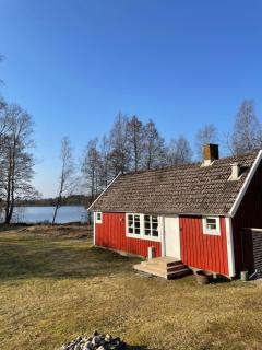 Stuga med sjöutsikt - Ryd - 0