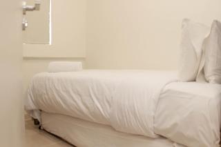 Minimalist and Cozy 3BR at Meikarta Apartment By Travelio - 4