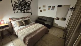 Suite climatizada, ao lado da praca principal - 1