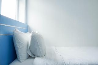 Homey and Fresh 2BR Green Pramuka Apartment By Travelio - 7