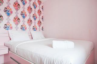 Homey and Fresh 2BR Green Pramuka Apartment By Travelio - 2