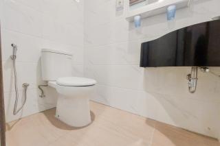 Homey and Simply Look Studio Sky House Alam Sutera Apartment By Travelio - Tangerang - 1